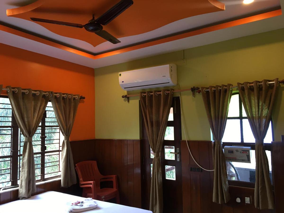 Whispering Woods Inn Болпур Екстериор снимка